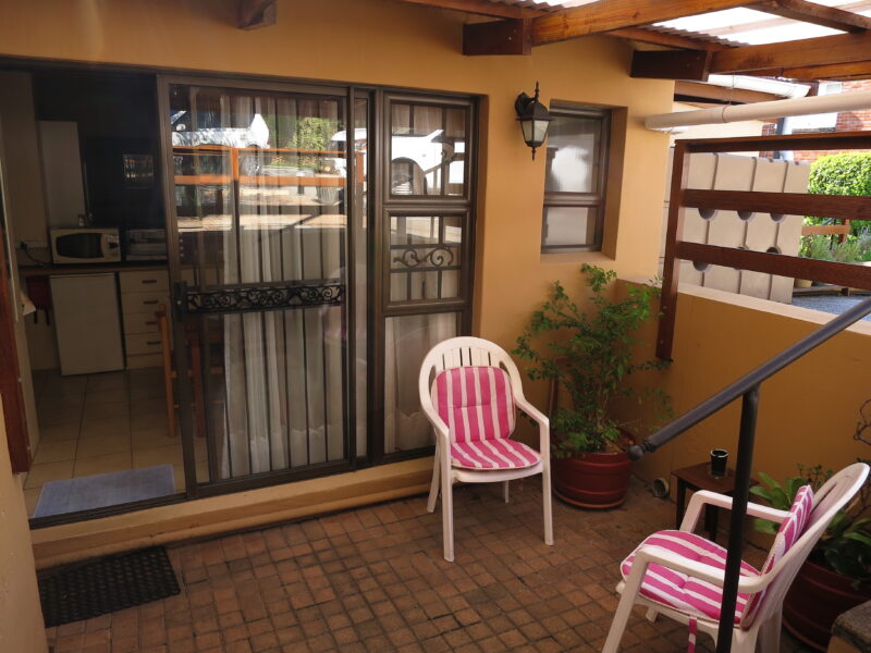 under cover outside patio twin room no.4