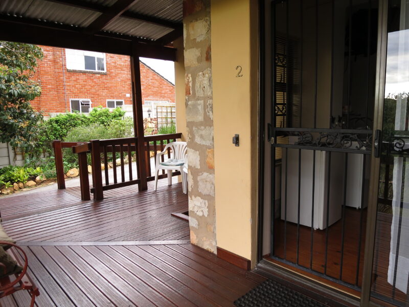 deck view of entrance to family room no.2 with accessible ramp in sight