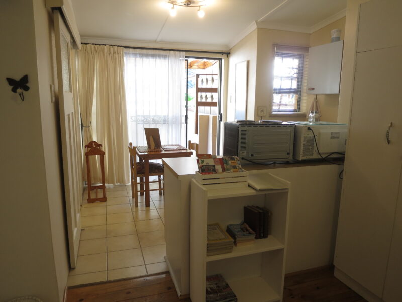 view towards kitchenette from bedroom area twin room no.4
